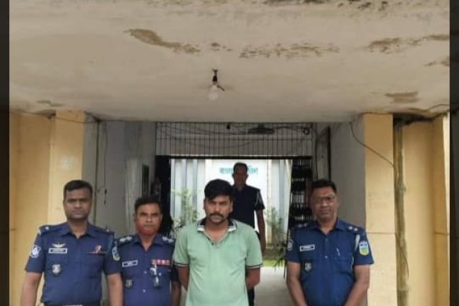 ধোবাউড়া ১০ বোতল ভারতীয় মদ সহ ডাউটের শিরমনি মাতাল রাসেল আটক।